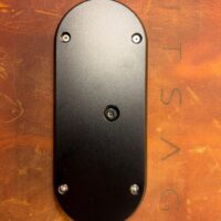 Back of the black SeedSigner+ Premium, machined aluminium plate with the camera opening
