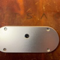 Silver machined aluminium back plate of the SeedSigner+ Premium